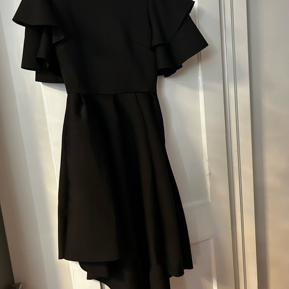Black dress with ruffles on sleeve NWT never been worn I purchased 2 diff sizes - Picture 2 of 3